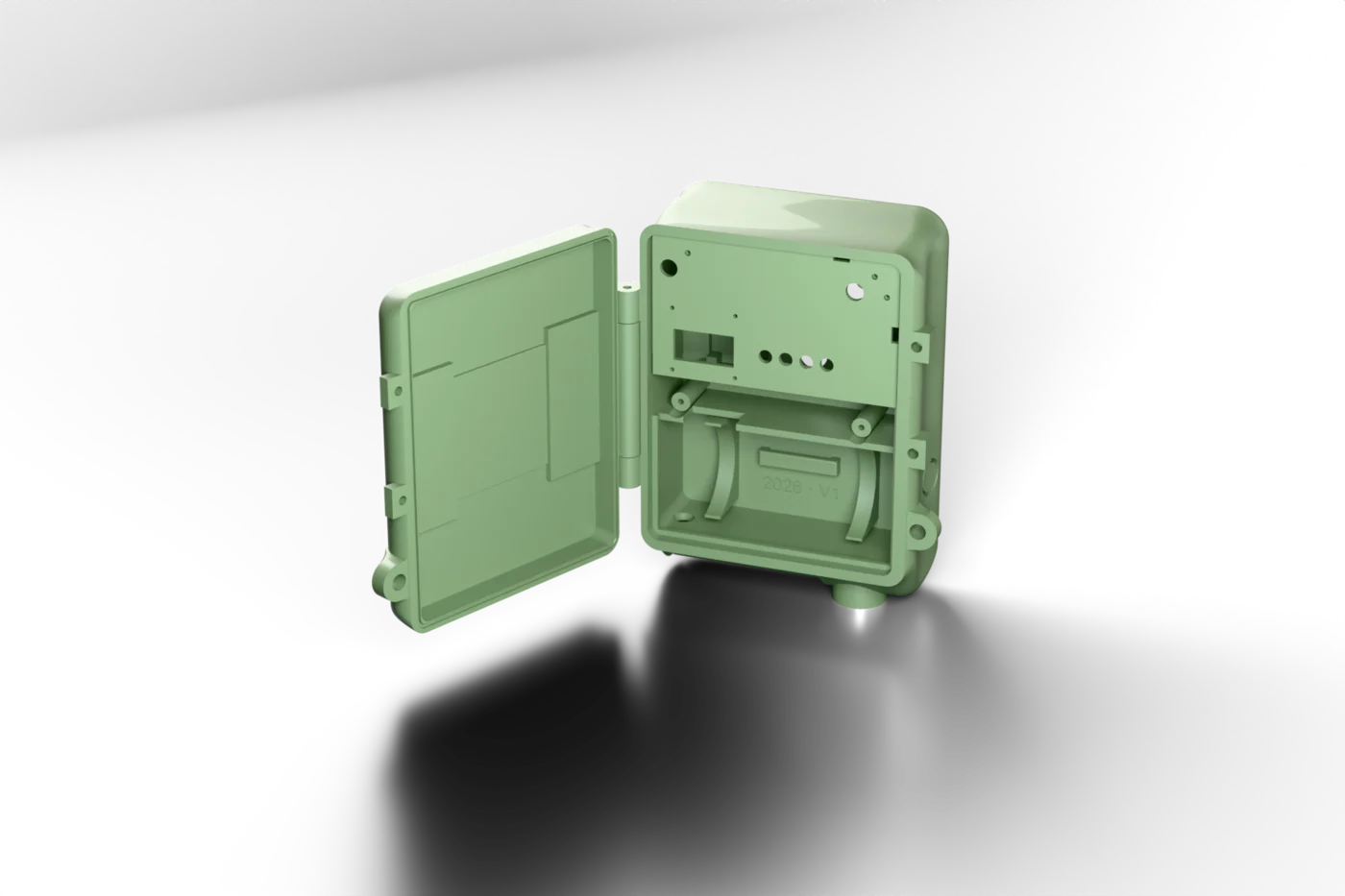 Trail camera housing with open lid showing the interior