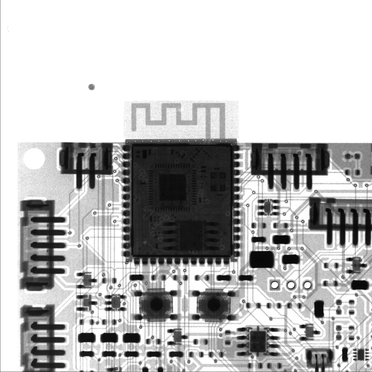 X-ray image of the assembled trail camera PCB with ESP32 module and traces